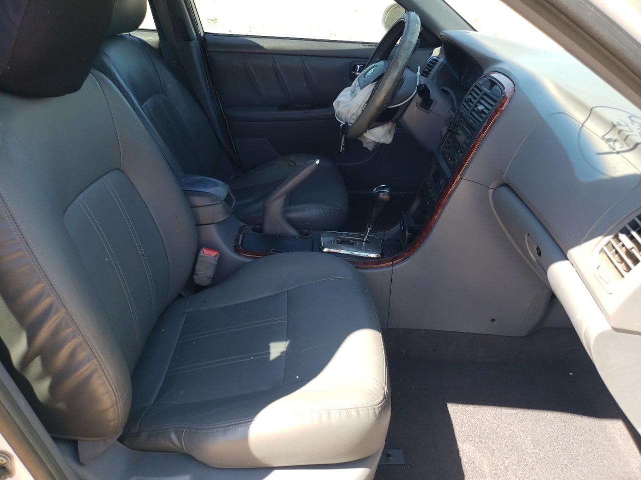 Photo 5 from auction – 2006 KIA OPTIMA LX with VIN KNAGD128565443751