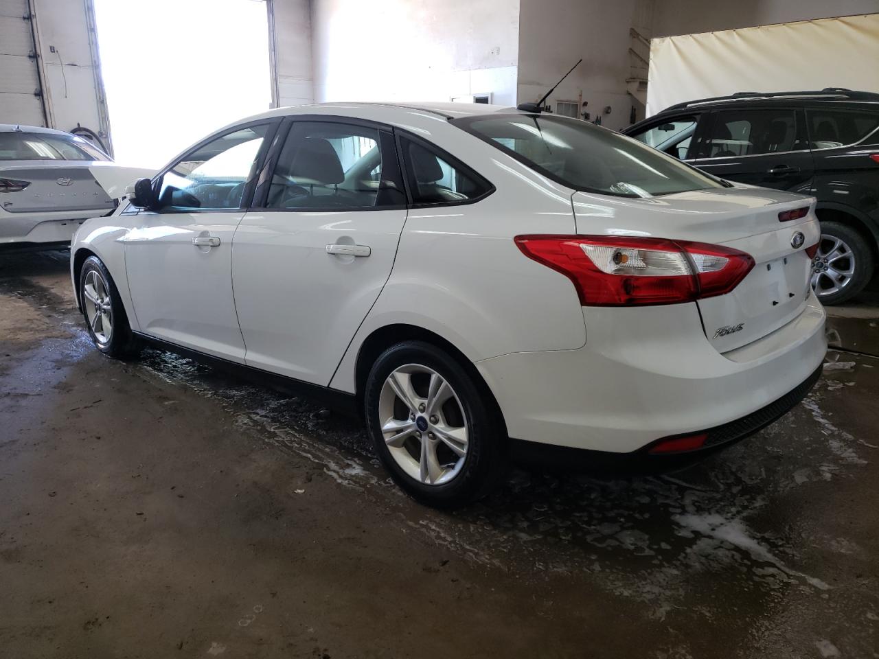 Photo 3 from auction – 2014 FORD FOCUS SE with VIN 1FADP3F28EL403503