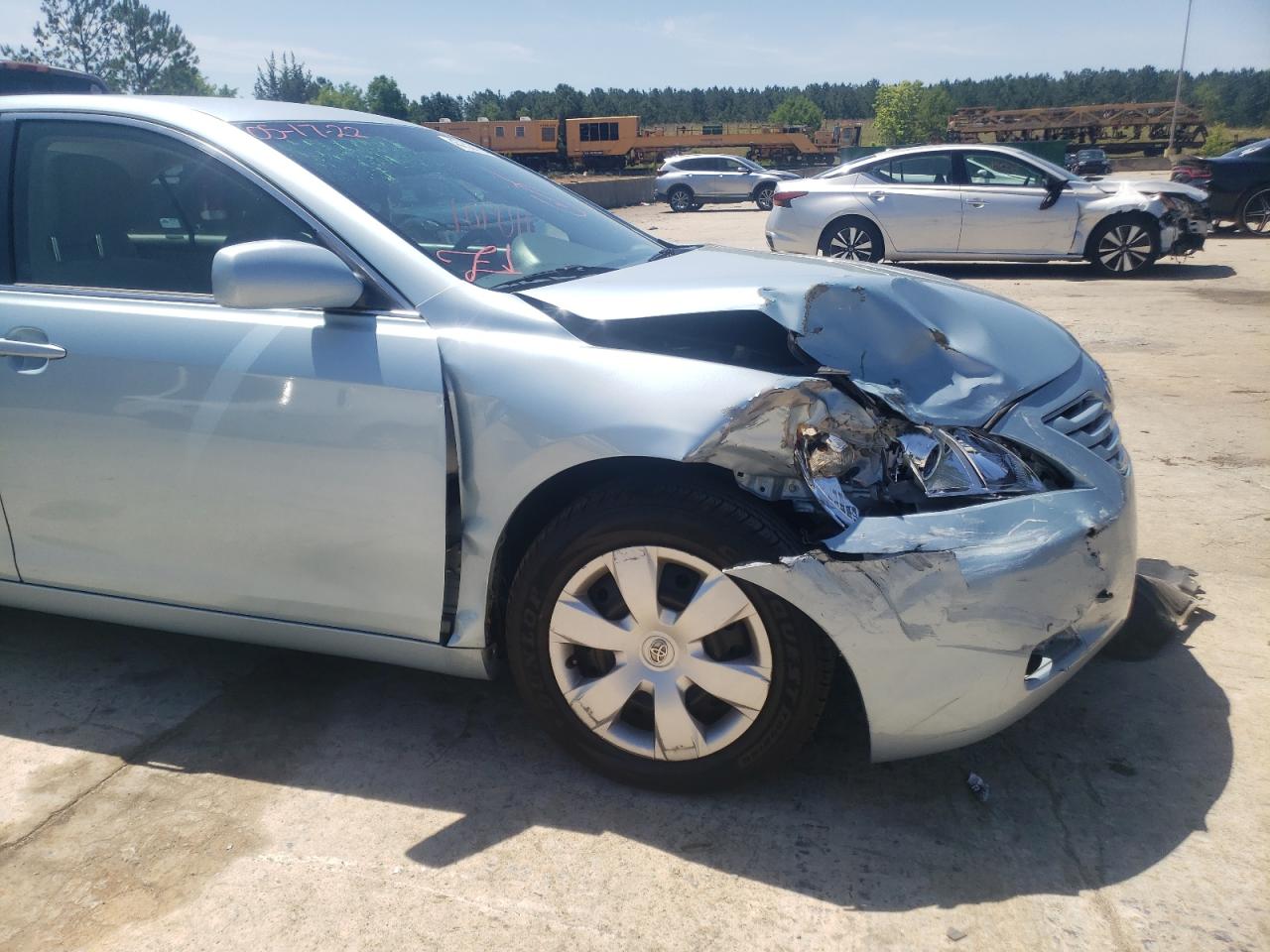 Photo 9 from auction – 2009 TOYOTA CAMRY with VIN 4T4BE46K99R121773