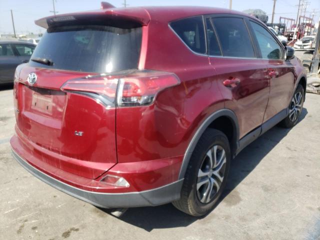 Photo 4 from auction – 2018 TOYOTA RAV4 LE with VIN 2T3ZFREV5JW441764