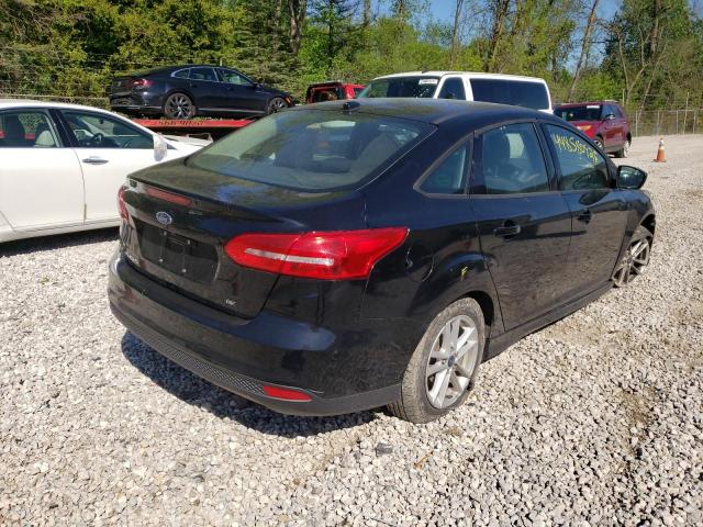 Photo 4 from auction – 2018 FORD FOCUS SE with VIN 1FADP3F25JL206184