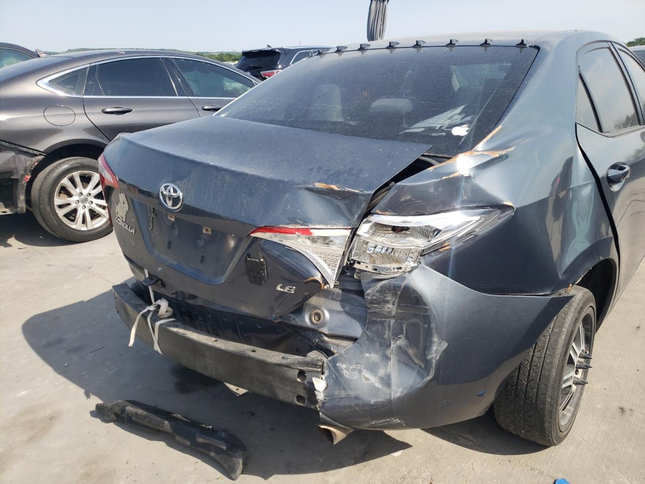 Photo 9 from auction – 2014 TOYOTA COROLLA L with VIN 5YFBURHE7EP046276