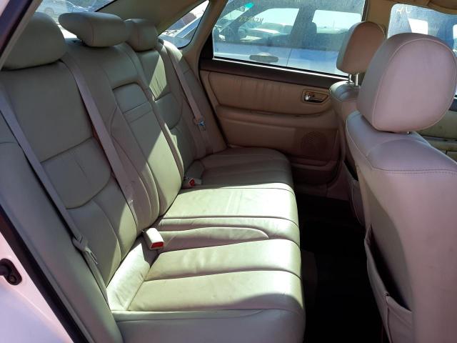 Photo 6 from auction – 2002 TOYOTA AVALON XL with VIN 4T1BF28BX2U227728