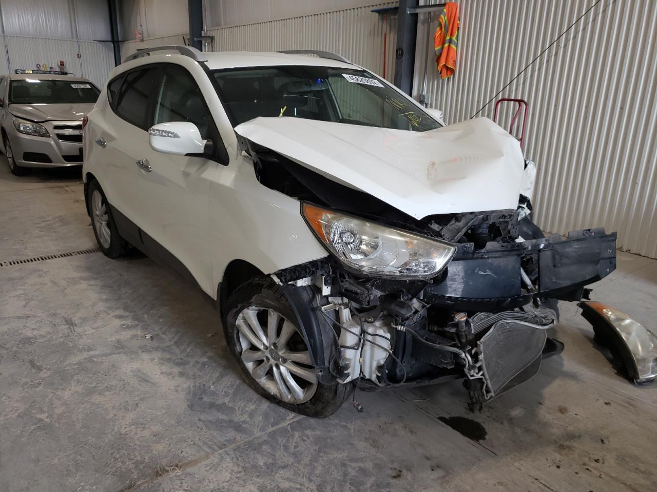 Photo 14 from auction – 2011 HYUNDAI TUCSON GLS with VIN KM8JUCAC5BU136182