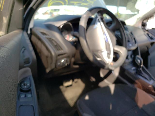 Photo 9 from auction – 2014 FORD FOCUS S with VIN 1FADP3E24EL354737