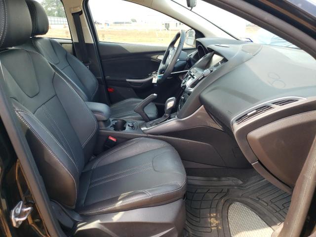Photo 5 from auction – 2014 FORD FOCUS TITA with VIN 1FADP3J23EL451823