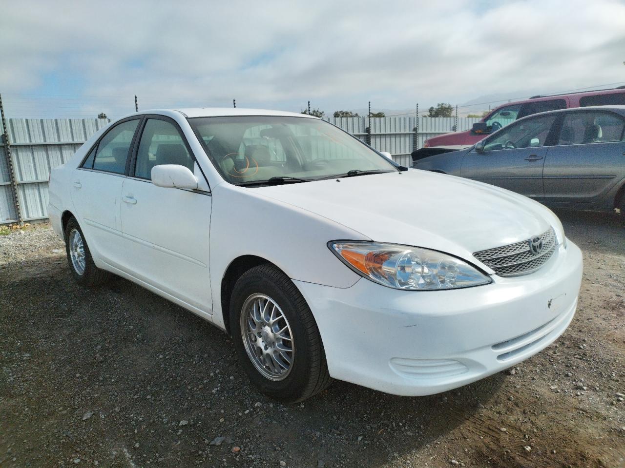 TOYOTA CAMRY LE 2002 with VIN JTDBE32K420041695 - Photo from auction