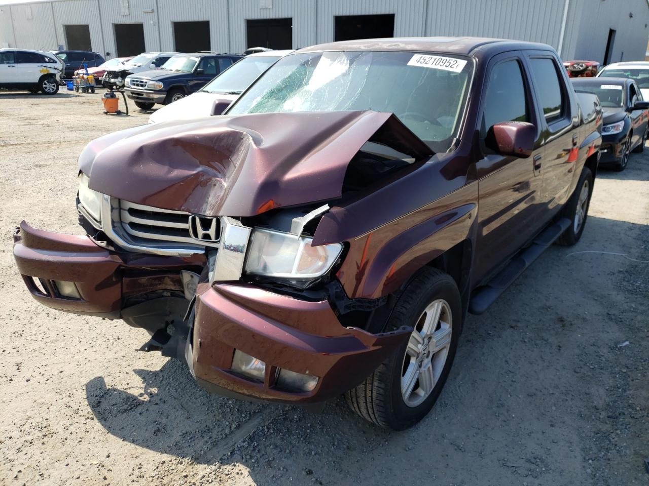 Photo 2 from auction – 2012 HONDA RIDGELINE with VIN 5FPYK1F57CB459514