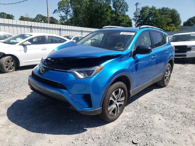Photo 2 from auction – 2017 TOYOTA RAV4 LE with VIN JTMZFREV8HJ136039