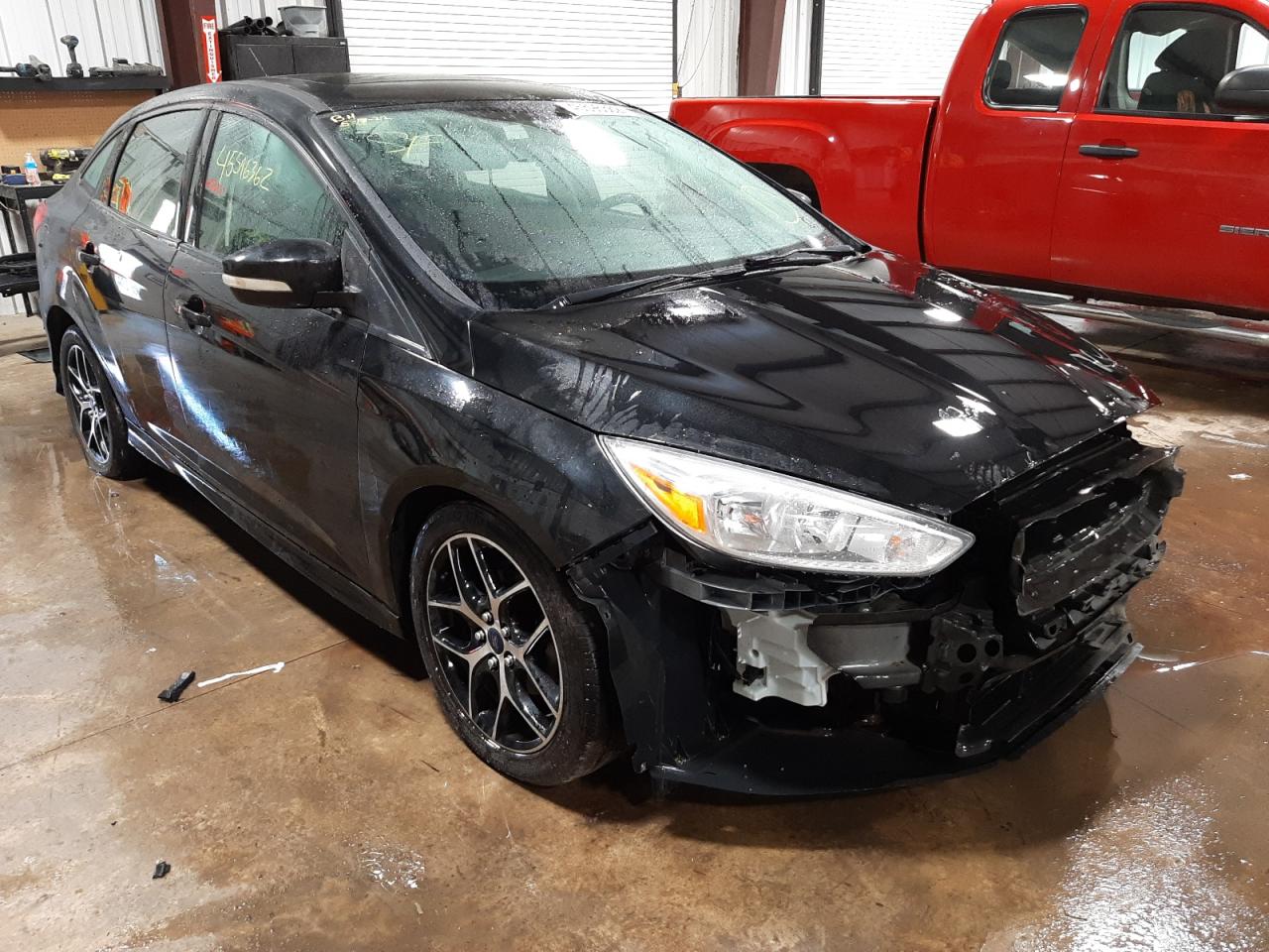 FORD FOCUS SE 2015 with VIN 1FADP3F22FL235195 - Photo from auction