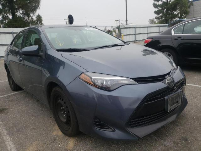 TOYOTA COROLLA L 2017 with VIN 5YFBURHE8HP670799 - Photo from auction