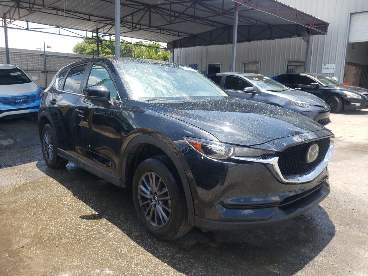 MAZDA CX-5 TOURI 2021 with VIN JM3KFACM5M0336977 - Photo from auction
