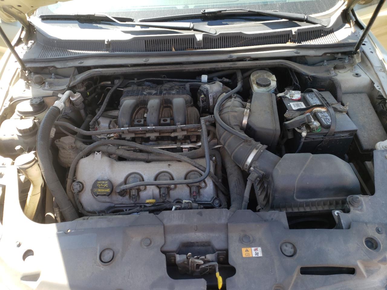 Photo 7 from auction – 2012 FORD TAURUS with VIN 1FAHP2FW1CG102138