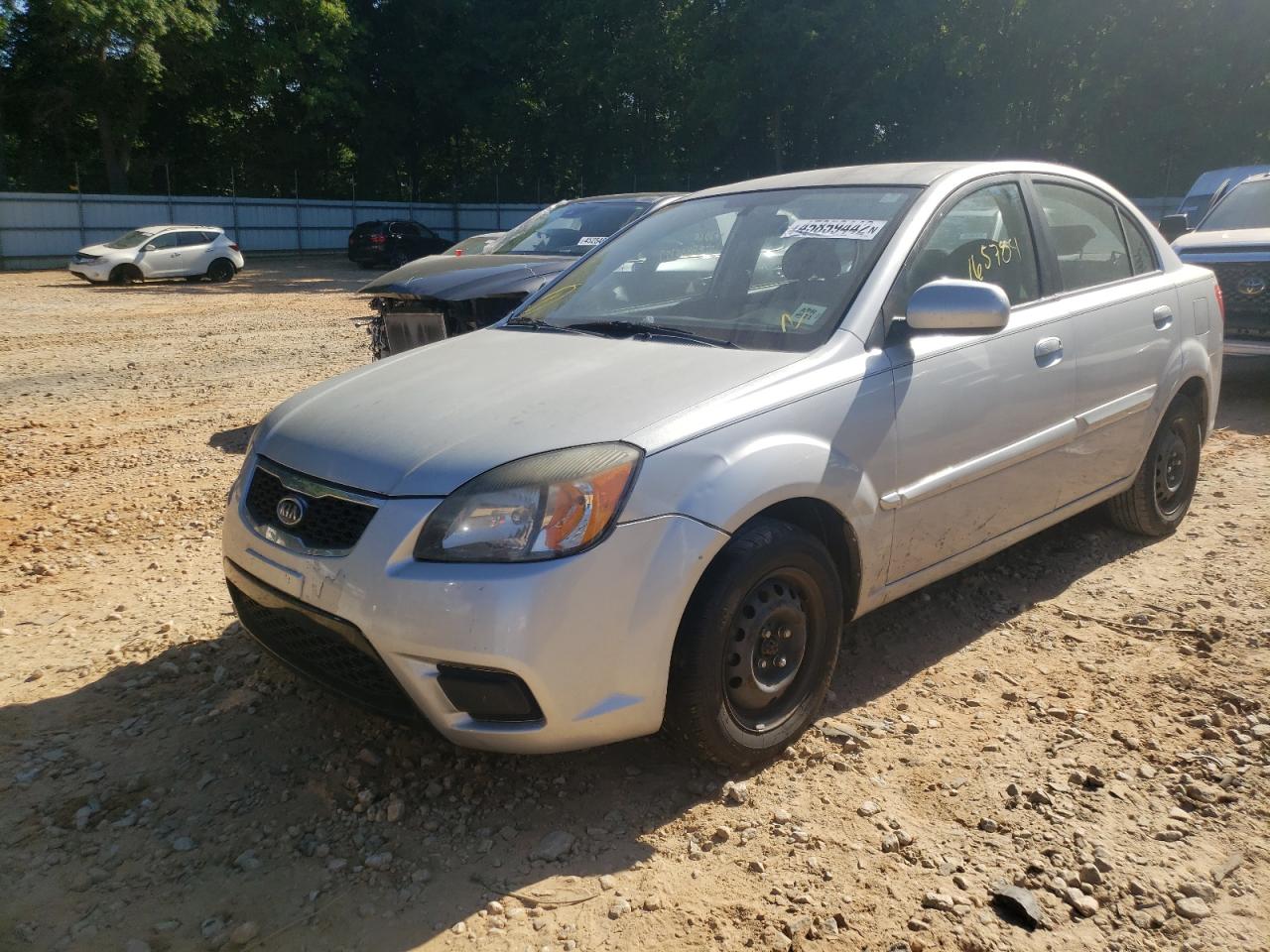 Photo 2 from auction – 2011 KIA RIO BASE with VIN KNADH4A30B6738176