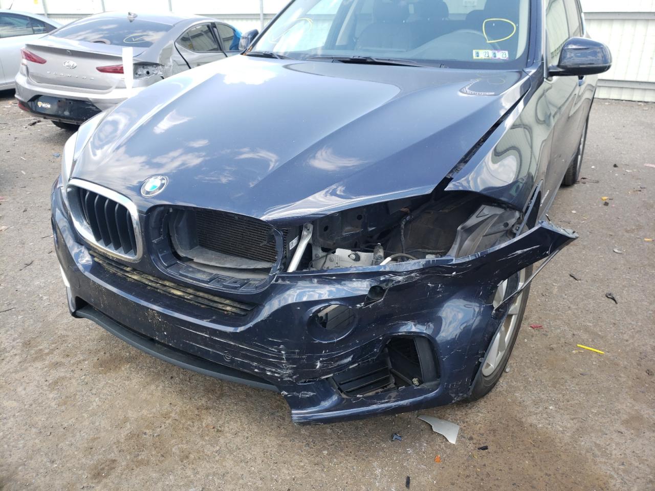 Photo 9 from auction – 2014 BMW X5 XDRIVE3 with VIN 5UXKR0C58E0K43647