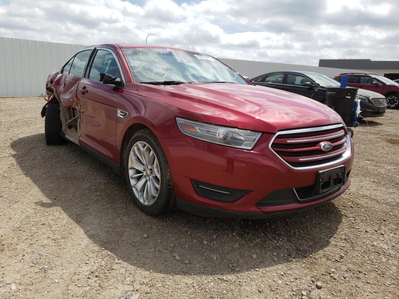 FORD TAURUS LIM 2014 with VIN 1FAHP2F84EG141150 - Photo from auction