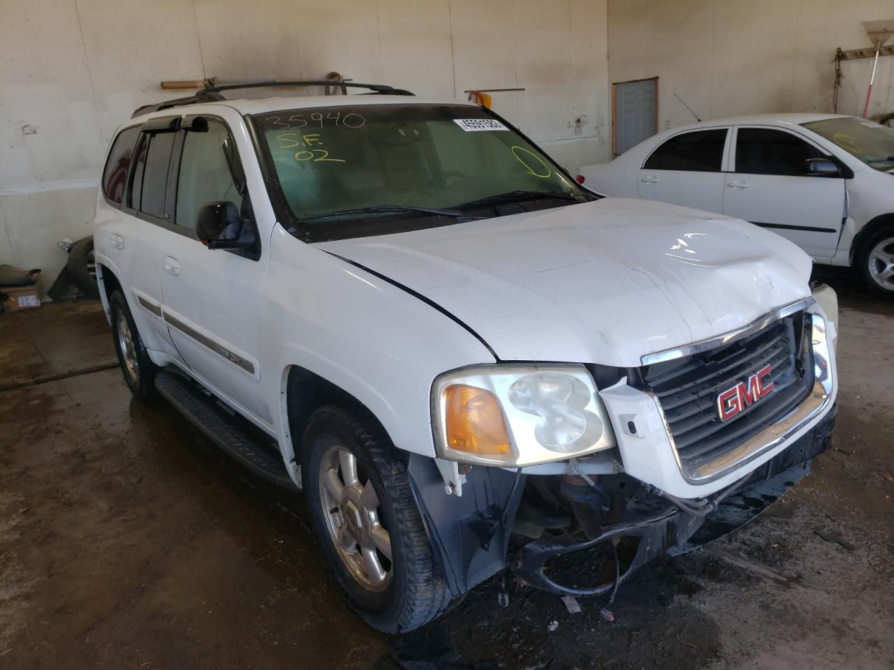 GMC ENVOY 2002 with VIN 1GKDT13S522235940 - Photo from auction