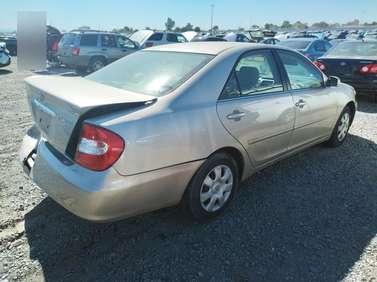 Photo 4 from auction – 2003 TOYOTA CAMRY LE with VIN 4T1BE32K83U225950