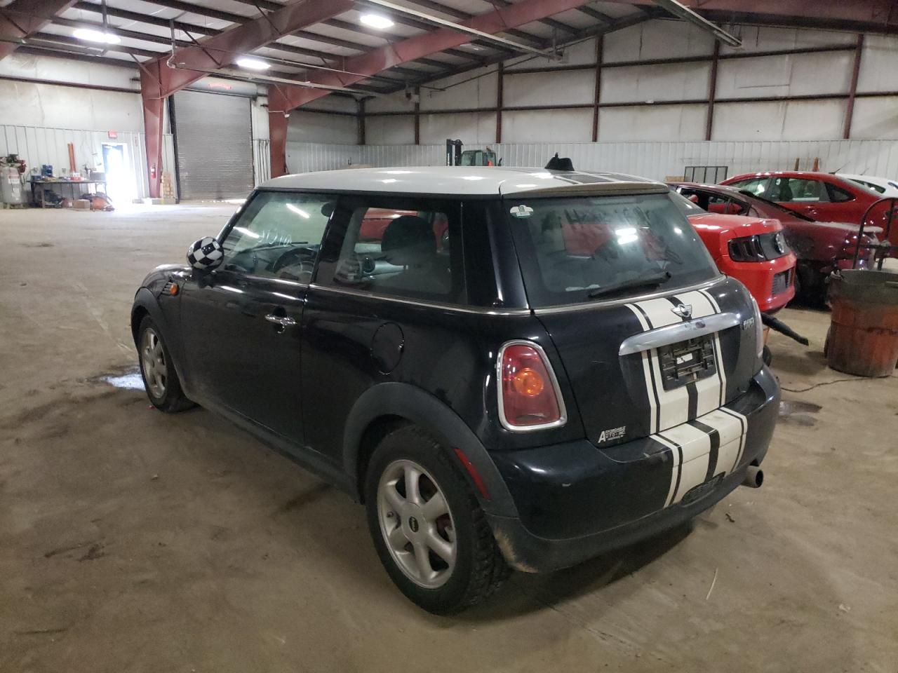 Photo 15 from auction – 2009 MINI COOPER with VIN WMWMF33599TW77159