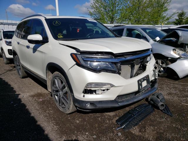 HONDA PILOT TOUR 2017 with VIN 5FNYF6H94HB506063 - Photo from auction
