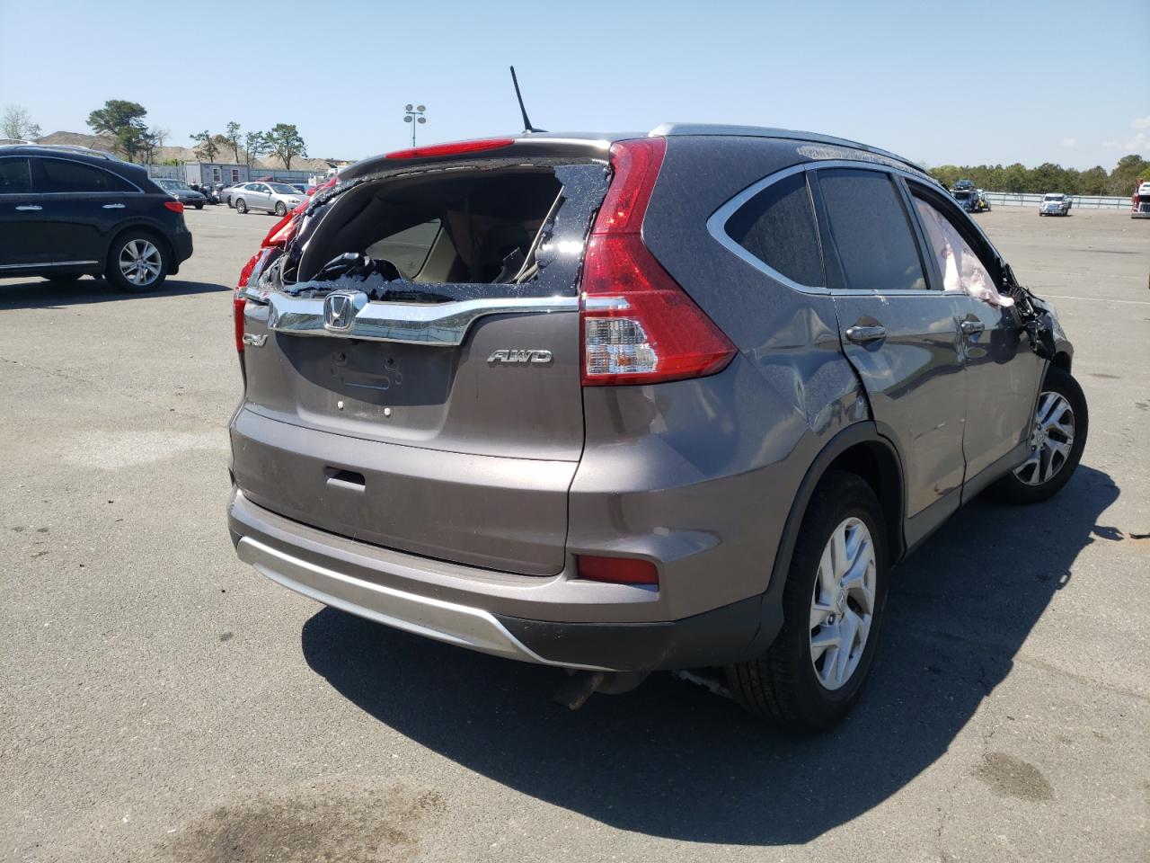 Photo 17 from auction – 2015 HONDA CR-V EXL with VIN 2HKRM4H71FH691684