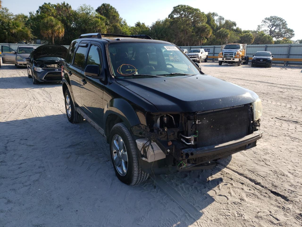 Photo 9 from auction – 2009 FORD ESCAPE LIM with VIN 1FMCU04739KB28707