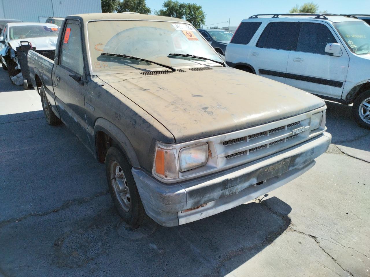 MAZDA B2000 1987 with VIN JM2UF1112H0528806 - Photo from auction