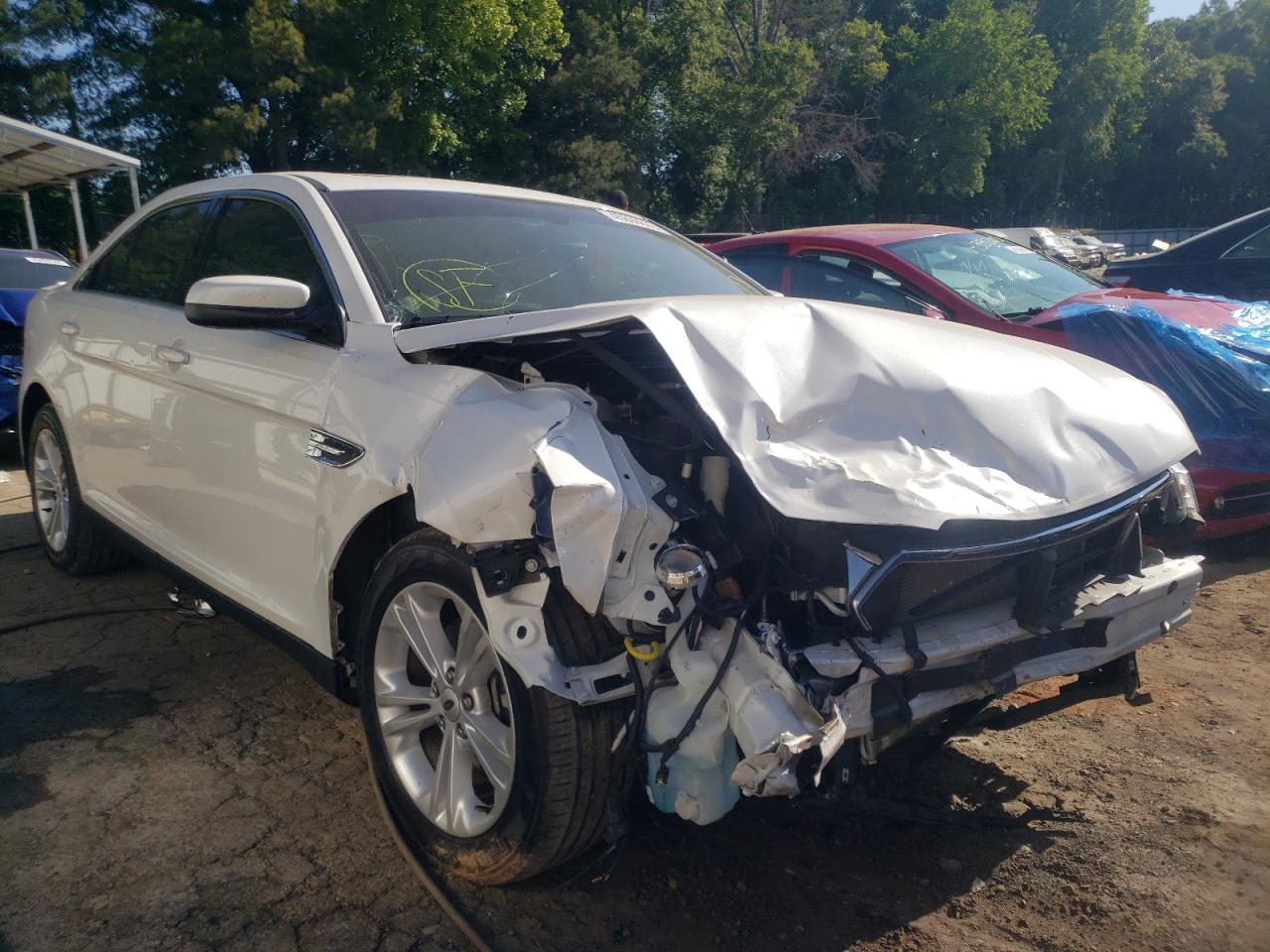 FORD TAURUS SEL 2014 with VIN 1FAHP2E87EG144772 - Photo from auction