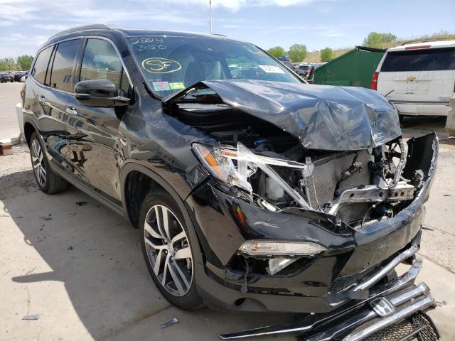 HONDA PILOT ELIT 2018 with VIN 5FNYF6H04JB046913 - Photo from auction