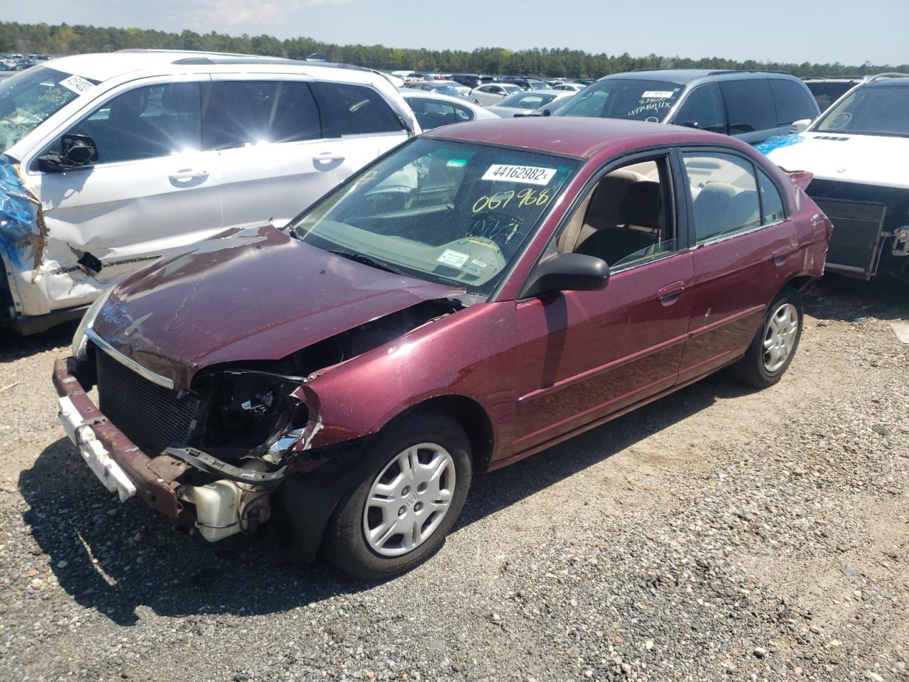 Photo 2 from auction – 2002 HONDA CIVIC LX with VIN 1HGES16522L067968