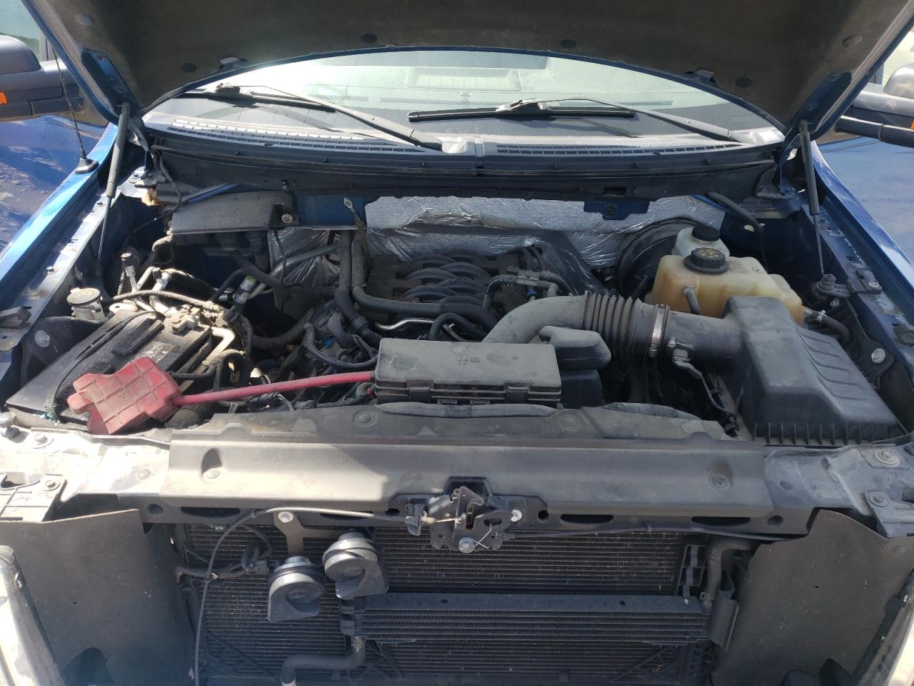 Photo 7 from auction – 2011 FORD F150 with VIN 1FTMF1CF6BKD61892