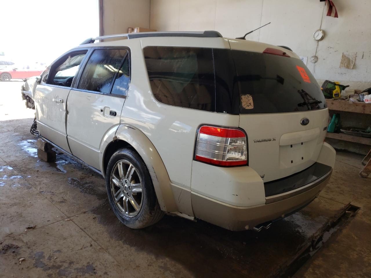 Photo 16 from auction – 2009 FORD TAURUS X E with VIN 1FMDK07W99GA00245
