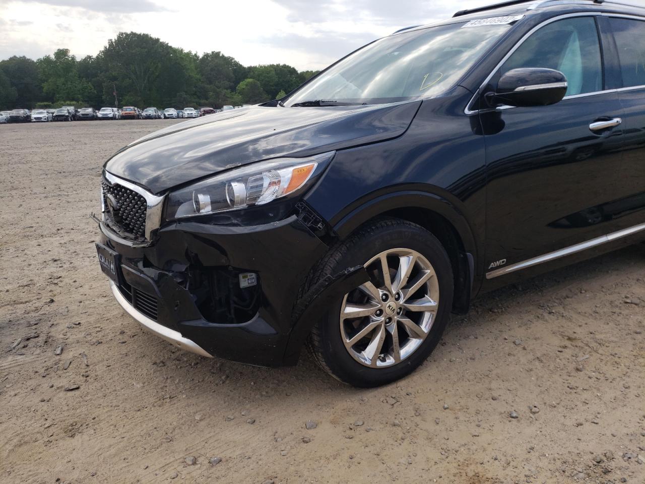Photo 9 from auction – 2016 KIA SORENTO SX with VIN 5XYPKDA51GG006730