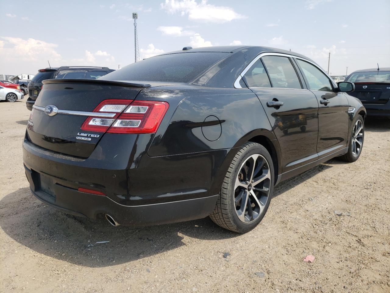 Photo 4 from auction – 2014 FORD TAURUS LIM with VIN 1FAHP2F85EG174240