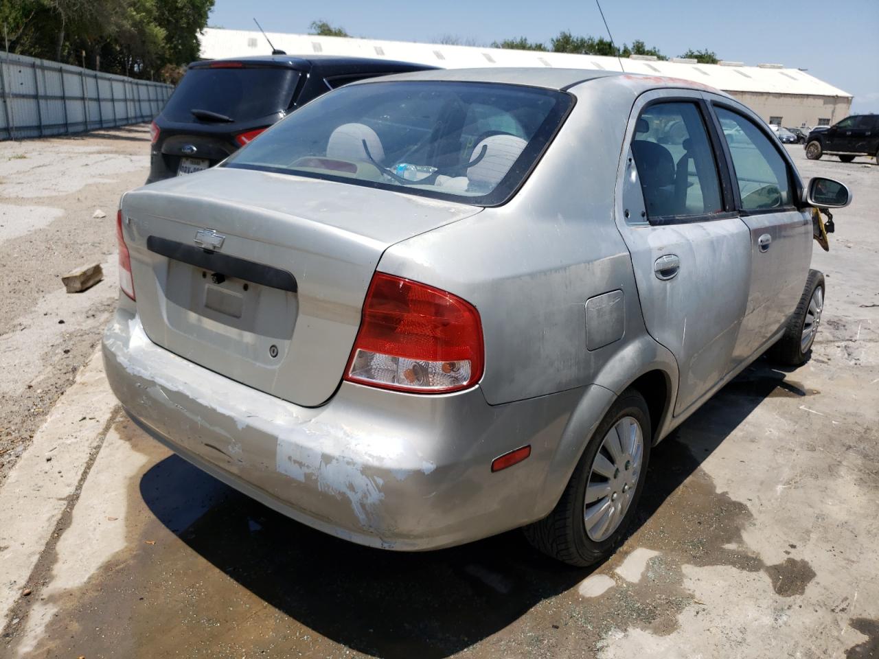 Photo 4 from auction – 2005 CHEVROLET AVEO BASE with VIN KL1TD526X5B440665