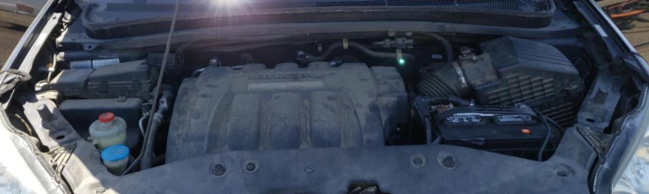 Photo 7 from auction – 2007 HONDA ODYSSEY EX with VIN 5FNRL387X7B065578
