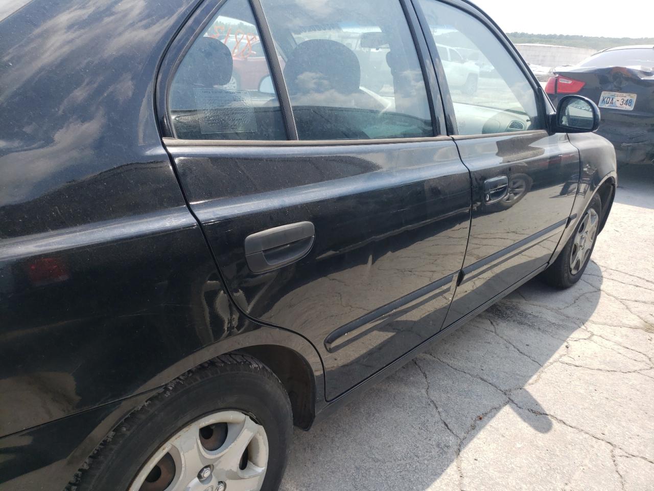 Photo 9 from auction – 2005 HYUNDAI ACCENT GL with VIN KMHCG45C65U608121