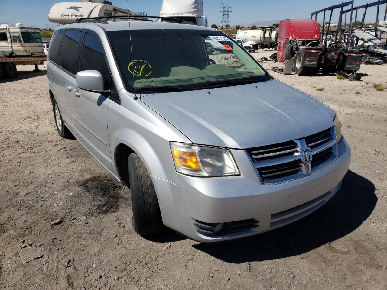 DODGE GRAND CARA 2010 with VIN 2D4RN5D13AR459560 - Photo from auction