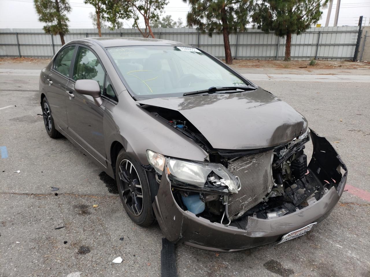 Photo 11 from auction – 2010 HONDA CIVIC LX with VIN 19XFA1F57AE063038