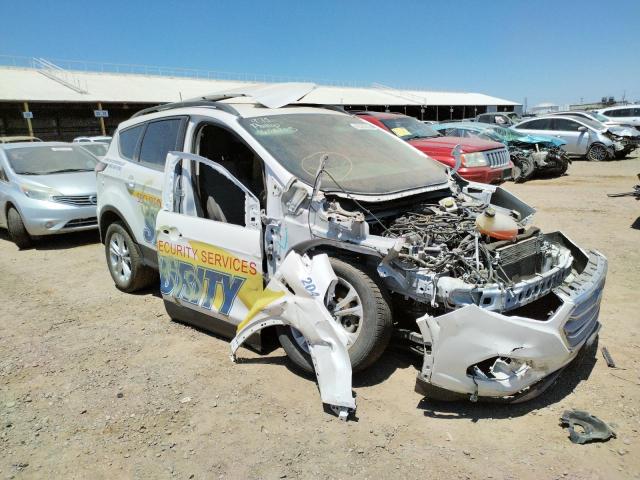 FORD ESCAPE SE 2018 with VIN 1FMCU9GDXJUA28585 - Photo from auction