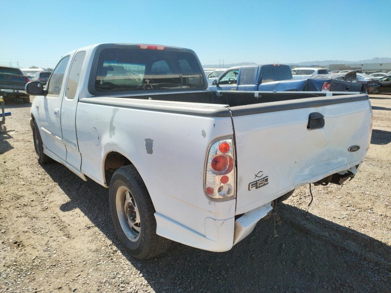Photo 3 from auction – 2002 FORD F150 with VIN 1FTRX17W02KA57809