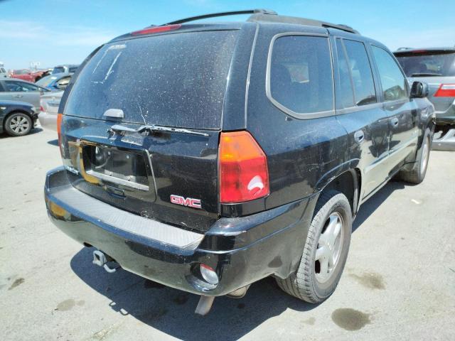 Photo 4 from auction – 2006 GMC ENVOY with VIN 1GKDS13SX62326307