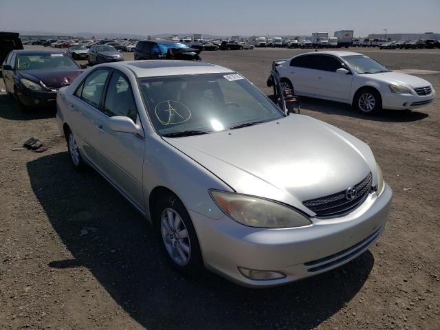 TOYOTA CAMRY LE 2003 with VIN JTDBE30K730152665 - Photo from auction