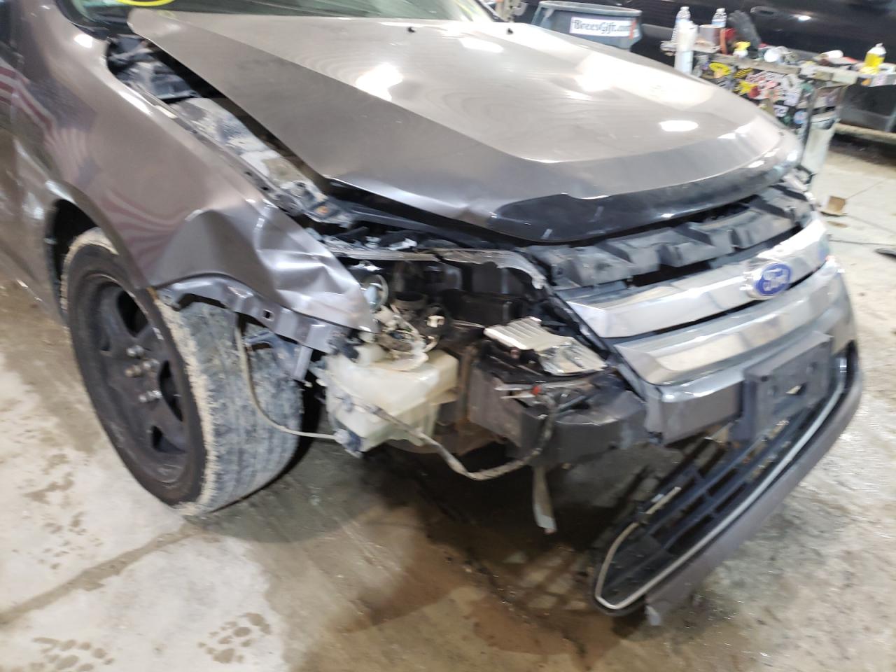 Photo 9 from auction – 2011 FORD FUSION SE with VIN 3FAHP0HA2BR260274