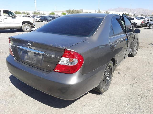 Photo 4 from auction – 2002 TOYOTA CAMRY LE with VIN 4T1BF30K72U523971