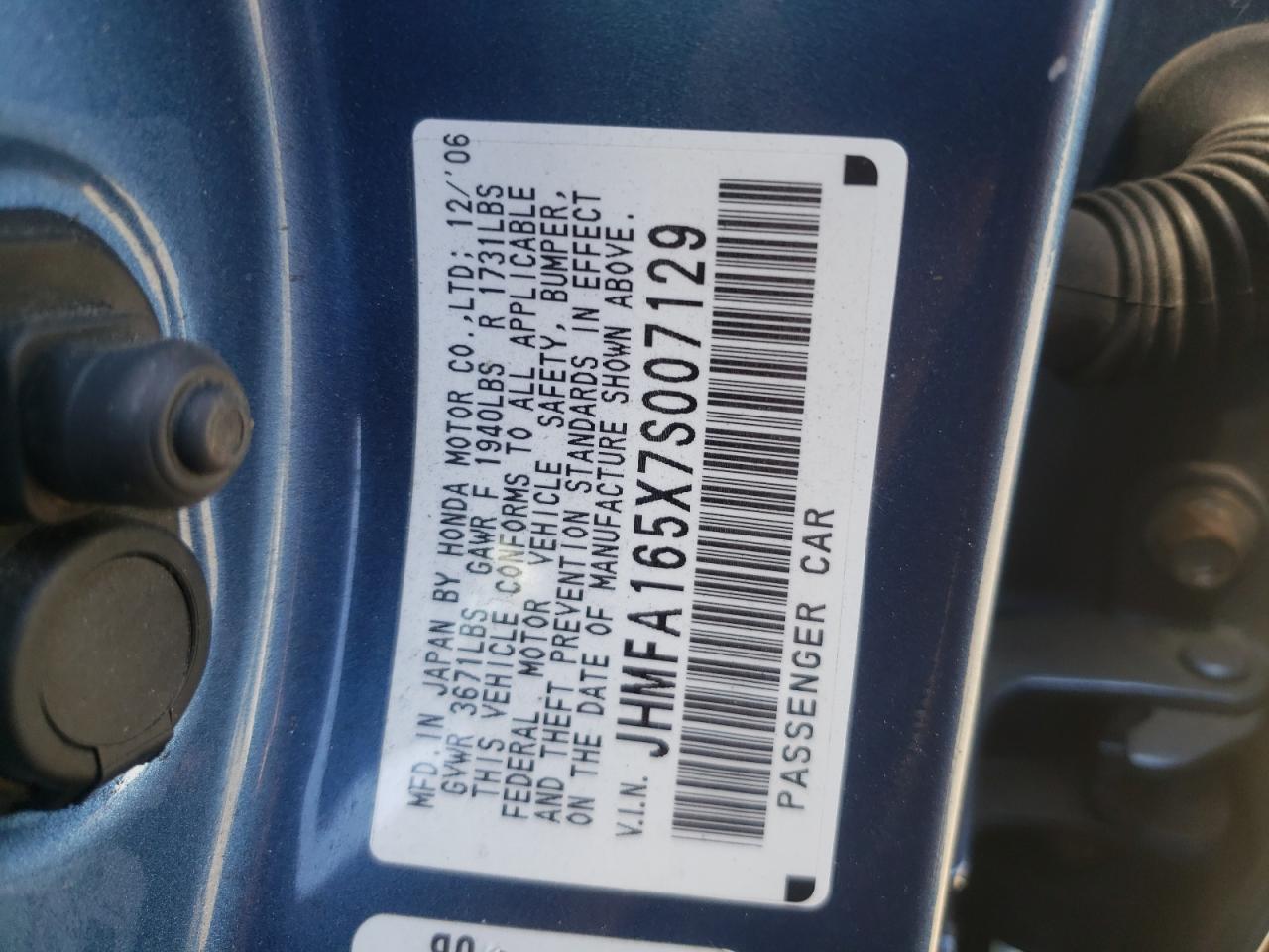 Photo 10 from auction – 2007 HONDA CIVIC LX with VIN JHMFA165X7S007129