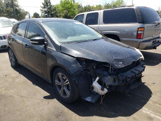 FORD FOCUS SE 2014 with VIN 1FADP3K28EL417097 - Photo from auction