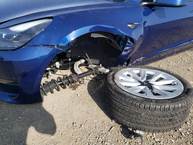 Photo 9 from auction – 2021 TESLA MODEL 3 with VIN 5YJ3E1EA5MF032102