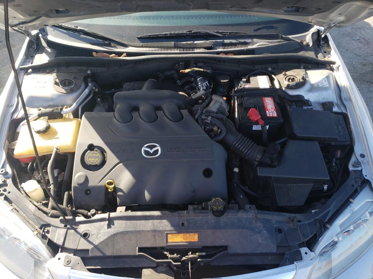 Photo 7 from auction – 2004 MAZDA 6 S with VIN 1YVHP80D245N13396