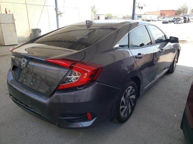 Photo 4 from auction – 2018 HONDA CIVIC EX with VIN 2HGFC2F79JH606090